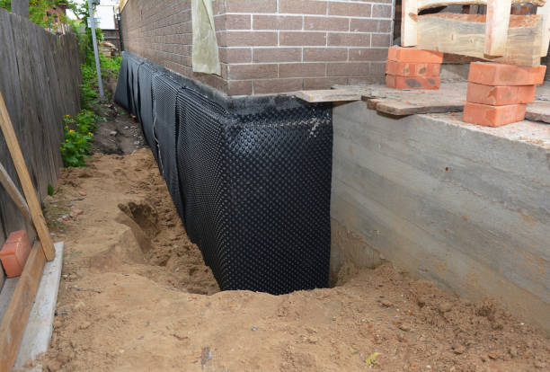 SJ Waterproofing Pros technician performing targeted Sump Pump Installation assessment in Orlinda, TN
